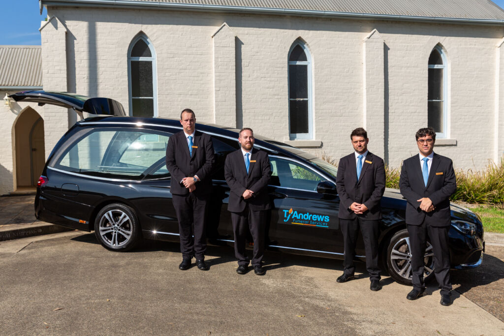 TJA Team with Hearse